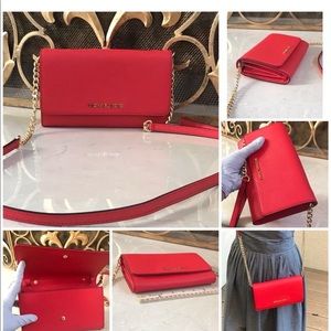 Michael Kors jet set wallet on a chain crossbody